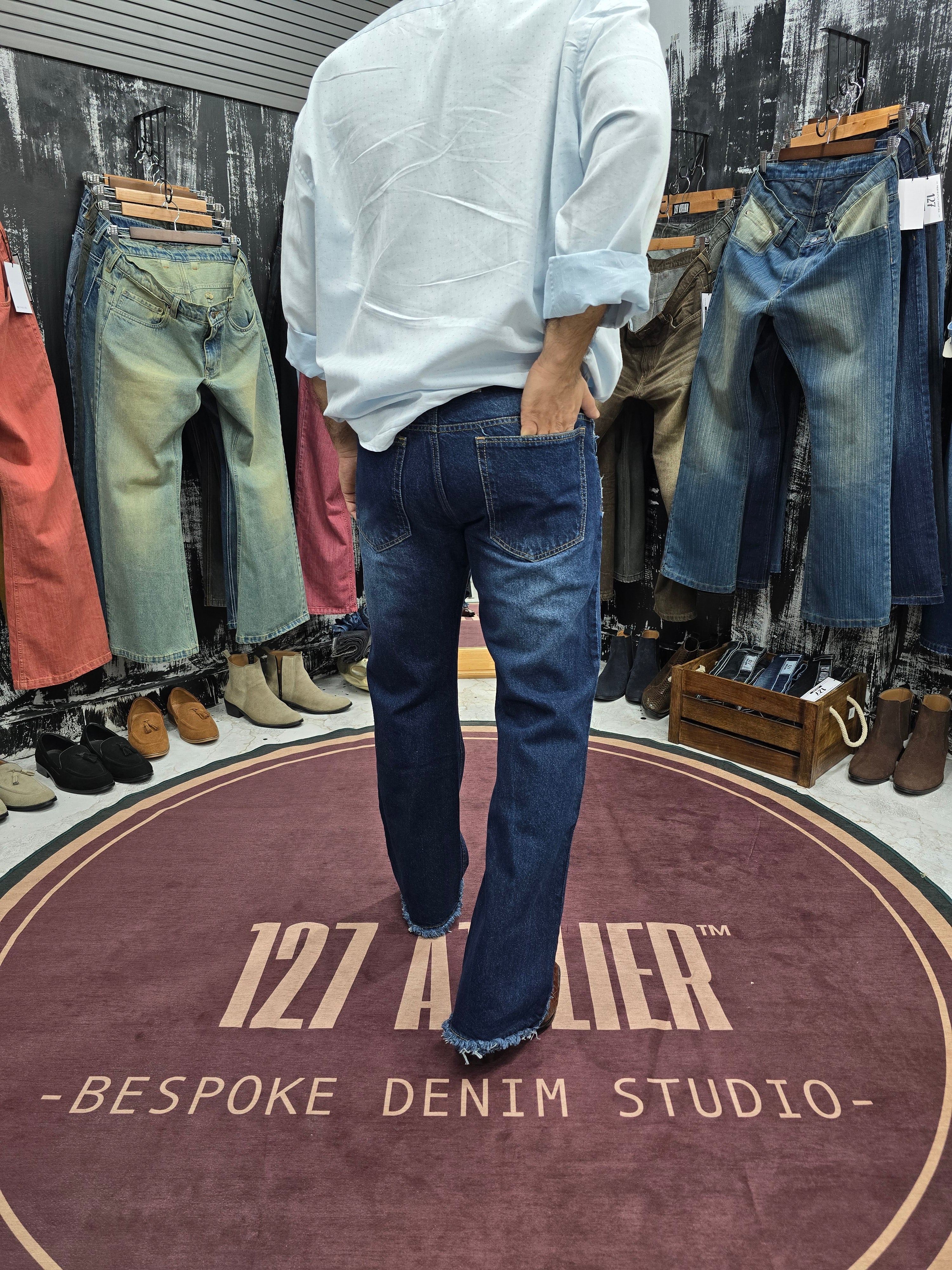 Distressed Indigo Semi Bootcut Jeans