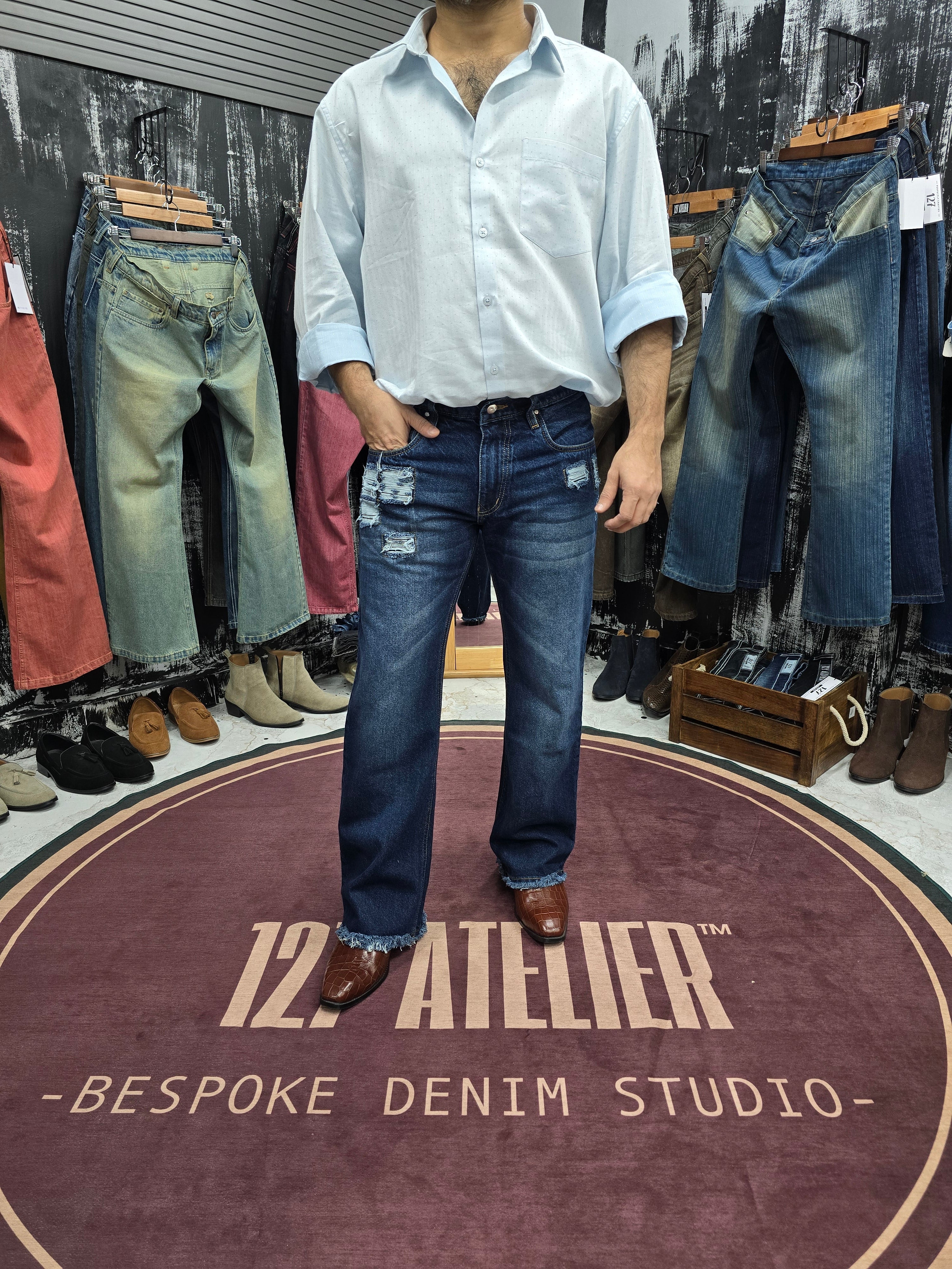 Distressed Indigo Semi Bootcut Jeans