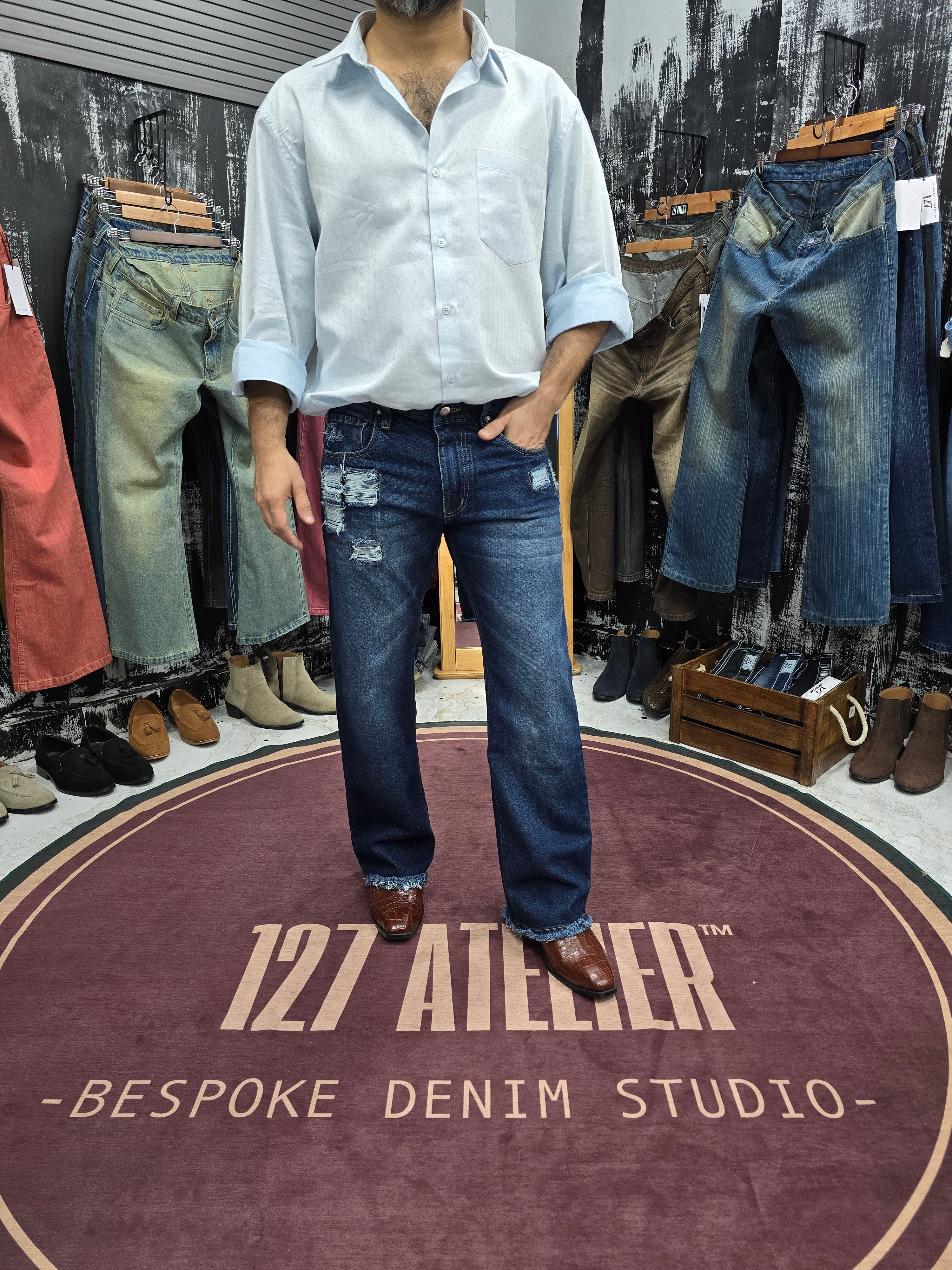 Distressed Indigo Semi Bootcut Jeans