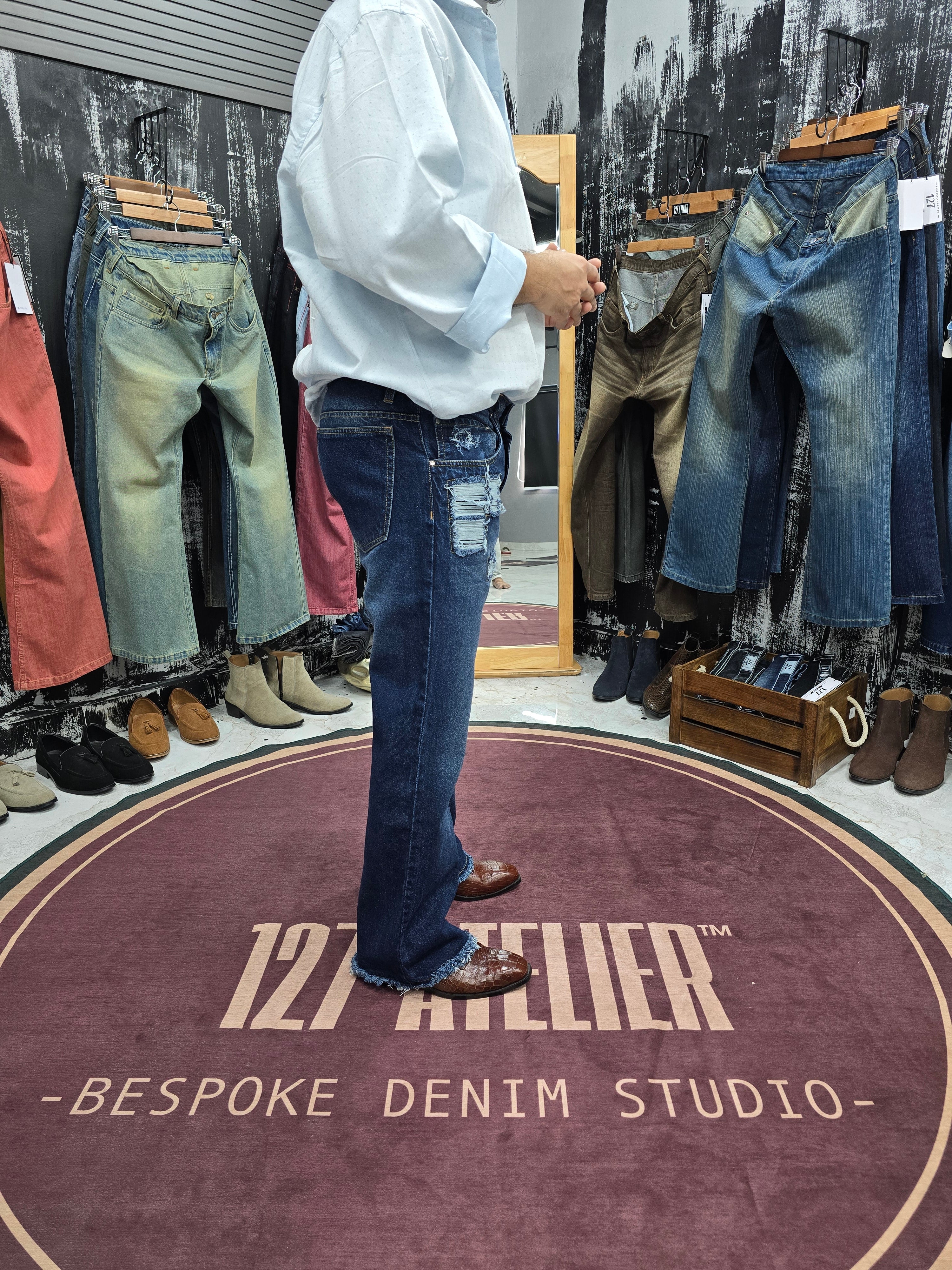 Distressed Indigo Semi Bootcut Jeans